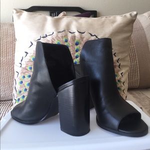 Boot shoe.  Black leather.